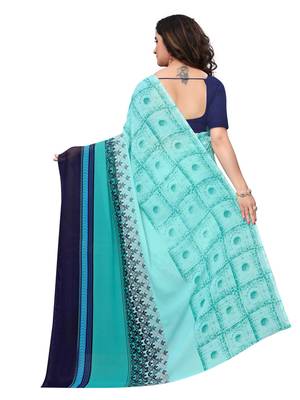 Turquoise printed georgette saree with blouse 4