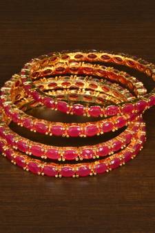 Gold Plated Red Stone Embellished Designer Wedding Bangles for Women
