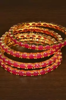 Gold Plated Red Stone Embellished Designer Wedding Bangles for Women