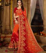 Orange embroidered georgette saree with blouse