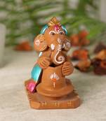 Aapno Rajasthan Multicolor Terracotta Pot Making Ganesh Showpiece