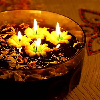 Aapno Rajasthan Yellow Flower Wax Candle Diyas- Set Of 4 2