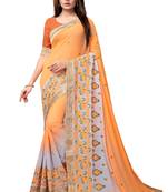 Orange embroidered georgette saree with blouse