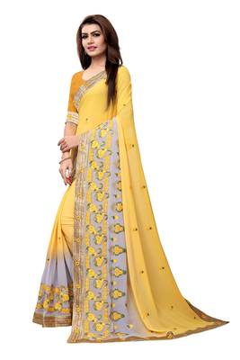 Yellow embroidered georgette saree with blouse 2