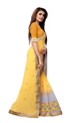 Yellow embroidered georgette saree with blouse 3