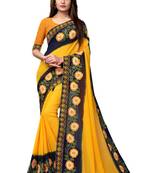 Yellow embroidered georgette saree with blouse