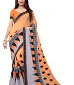Orange embroidered georgette saree with blouse