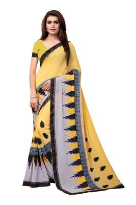 Yellow embroidered georgette saree with blouse 1