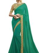 Green embroidered faux georgette saree with blouse