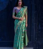 Green woven banarasi art silk saree with blouse
