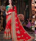 Pink embroidered art silk saree with blouse