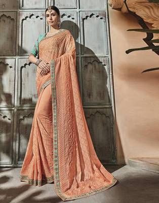 Peach embroidered silk saree with blouse 1