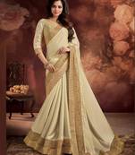 Off white embroidered satin saree with blouse