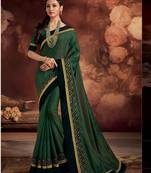 Green embroidered satin saree with blouse