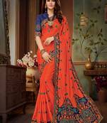 Rust embroidered silk blend saree with blouse