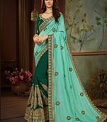 Sea green embroidered silk blend saree with blouse