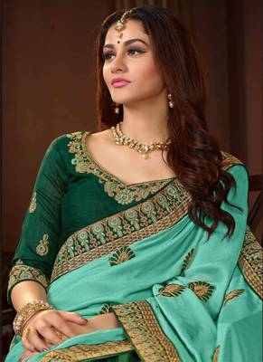 Sea green embroidered silk blend saree with blouse 2