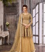 Beige embroidered net salwar with dupatta