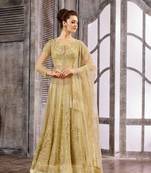Beige embroidered net salwar with dupatta