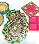 Beautiful combo of decorative plate, diya and haldi kumkum box