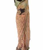 Peach embroidred net saree With Blouse