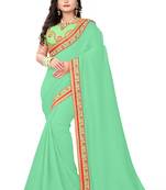 Sea green embroidered faux silk saree with blouse