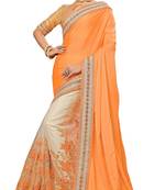 Yellow embroidered satin saree with blouse