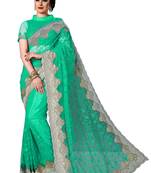 Green embroidered net saree with blouse