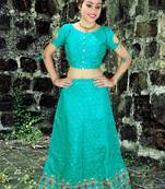 Green embroidered silk semi stitched lehenga with dupatta