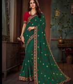 Green embroidered silk saree with blouse