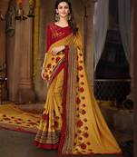 Yellow embroidered georgette saree with blouse