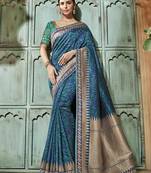 Blue embroidered silk saree with blouse