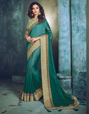 Green embroidered silk saree with blouse 1