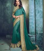 Green embroidered silk saree with blouse