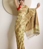 Beige hand woven tissue saree with blouse