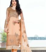 Peach embroidered net salwar with dupatta