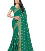 Green embroidered georgette saree with blouse
