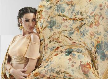Peach printed georgette saree with blouse 4