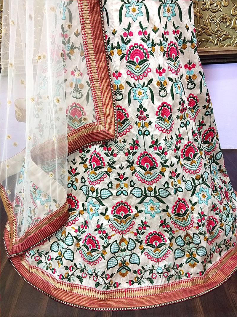 White worked taffeta silk lahenga choli with blouse