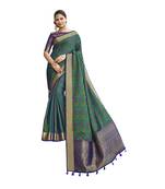 Teal woven banarasi saree with blouse