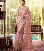 Light pink embroidered net saree with blouse