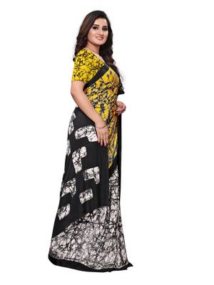 Yellow printed crepe saree with blouse 3