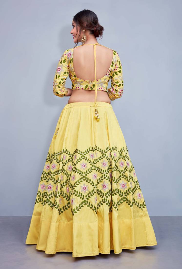 Yellow embroidery art silk designer ethnic lehengas with matching