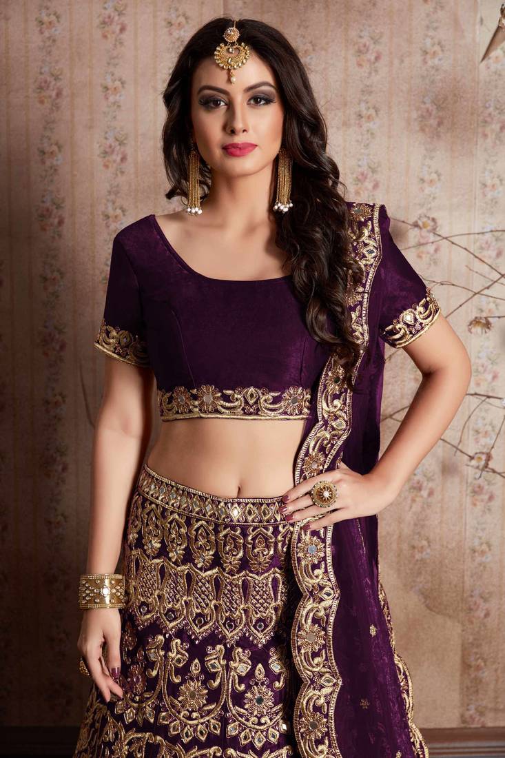 Purple embroidery velvet designer ethnic lehengas with matching blouse