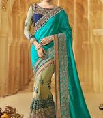 Turquoise embroidered georgette saree with blouse