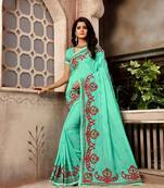 Light sea green embroidered faux silk saree with blouse
