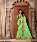 Light green embroidered faux silk saree with blouse