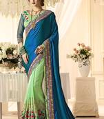 Turquoise embroidered georgette saree with blouse