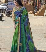 Green embroidered georgette saree with blouse