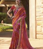 Red embroidered georgette saree with blouse